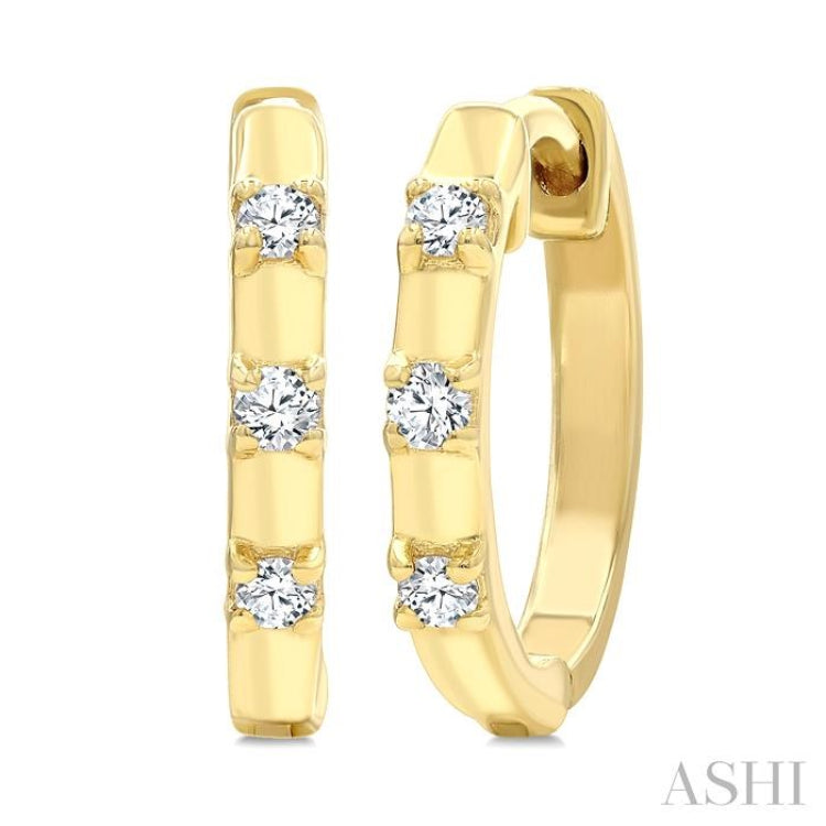 1/10 Ctw Round Cut Diamond Petite Huggie Earrings in 10K Yellow Gold 1/10 Ctw Round Cut Diamond Petite Huggie Earrings in 10K Yellow Gold