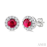 3.25 MM Round Ruby and 1/10 Ctw Round Cut Diamond Halo Precious Stud Earrings in 10K White Gold