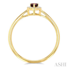 5x3 MM Pear Shape Garnet and 1/20 Ctw Single Cut Diamond Halo Semi-Precious Ring in 10K Yellow Gold 5x3 MM Pear Shape Garnet and 1/20 Ctw Single Cut Diamond Halo Semi-Precious Ring in 10K Yellow Gold