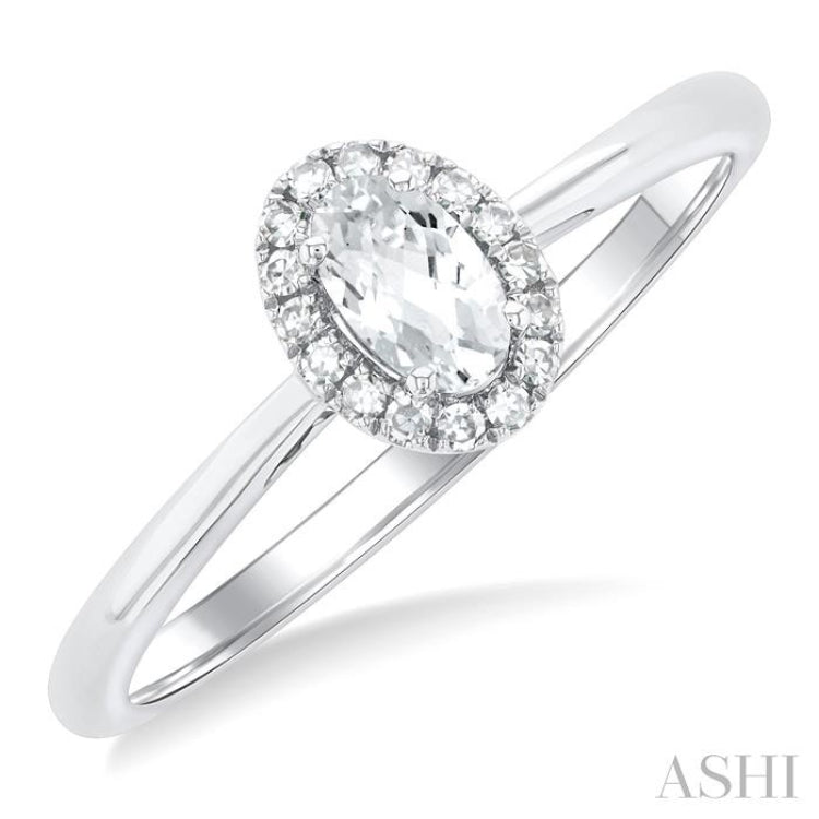 5x3 MM Oval Shape White Topaz and 1/20 Ctw Single Cut Diamond Halo Semi-Precious Ring in 14K White Gold 5x3 MM Oval Shape White Topaz and 1/20 Ctw Single Cut Diamond Halo Semi-Precious Ring in 14K White Gold