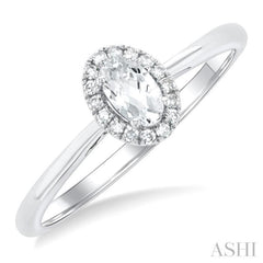 5x3 MM Oval Shape White Topaz and 1/20 Ctw Single Cut Diamond Halo Semi-Precious Ring in 14K White Gold 5x3 MM Oval Shape White Topaz and 1/20 Ctw Single Cut Diamond Halo Semi-Precious Ring in 14K White Gold