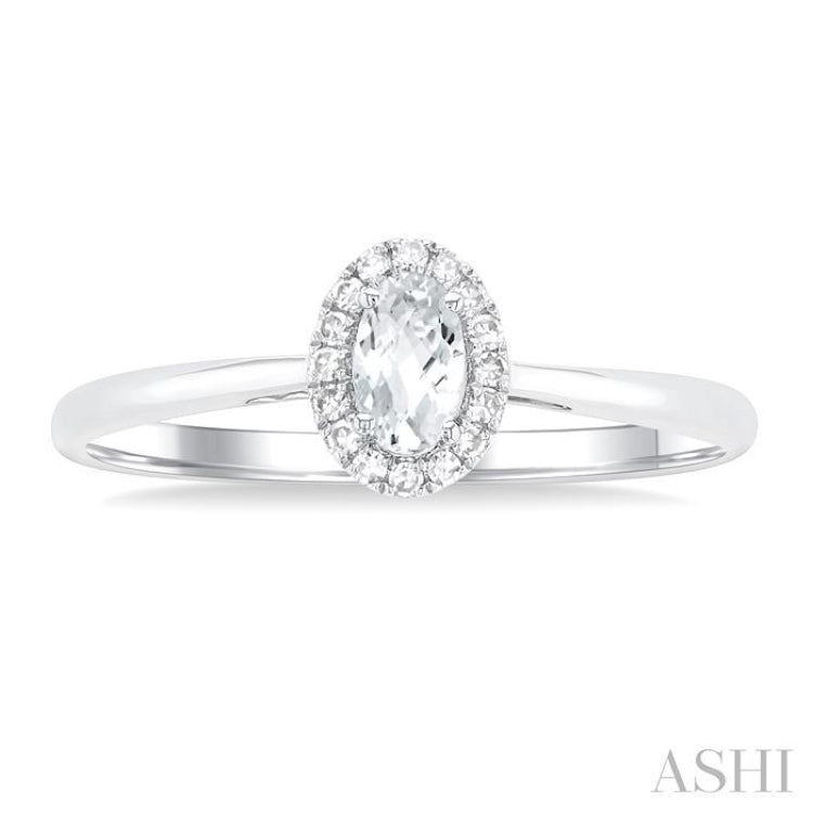 5x3 MM Oval Shape White Topaz and 1/20 Ctw Single Cut Diamond Halo Semi-Precious Ring in 14K White Gold 5x3 MM Oval Shape White Topaz and 1/20 Ctw Single Cut Diamond Halo Semi-Precious Ring in 14K White Gold