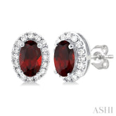 5x3 MM Oval Shape Garnet and 1/8 Ctw Single Cut Diamond Halo Semi-Precious Stud Earrings in 14K White Gold