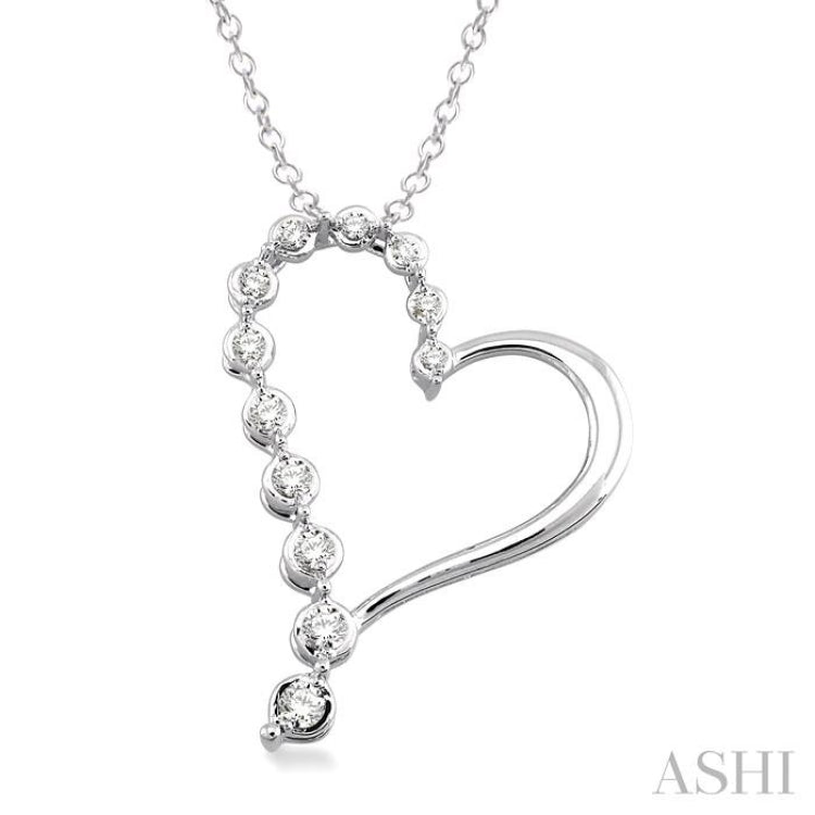 1/10 Ctw Round Cut Diamond Heart Pendant in Sterling Silver with Chain 1/10 Ctw Round Cut Diamond Heart Pendant in Sterling Silver with Chain