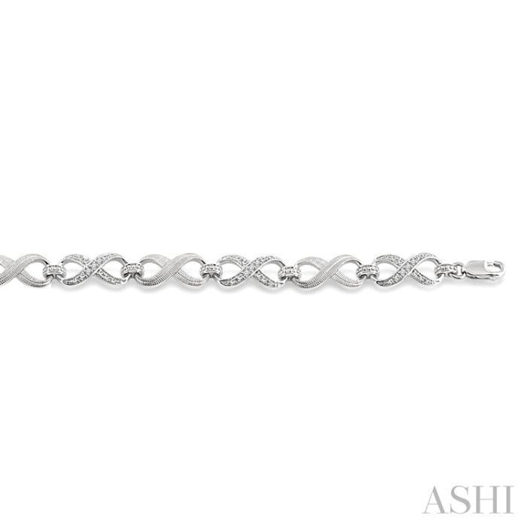 1/10 Ctw Round Cut Diamond Swirl bracelet in Sterling Silver 1/10 Ctw Round Cut Diamond Swirl bracelet in Sterling Silver