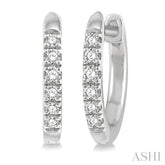 1/8 Ctw Round Cut Diamond Huggie Petite Earrings in 10K White Gold