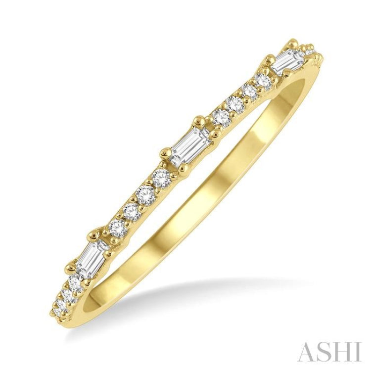 1/5 Ctw Baguette and Round Cut Diamond Stackable Petite Fashion Band in 10K Yellow Gold 1/5 Ctw Baguette and Round Cut Diamond Stackable Petite Fashion Band in 10K Yellow Gold