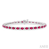 4X3 MM Oval Cut Ruby and 1/3 Ctw Round Cut Diamond Precious Bracelet in 14K White Gold