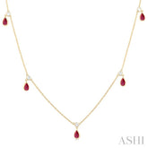 5x3 MM Pear Shape Ruby and 1/8 Ctw Round Cut Diamonds Precious Station Necklace in 10K Yellow Gold