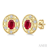 4x3 MM Oval Shaped Ruby and 1/10 Ctw Round Cut Diamond Earrings in 10K Yellow Gold