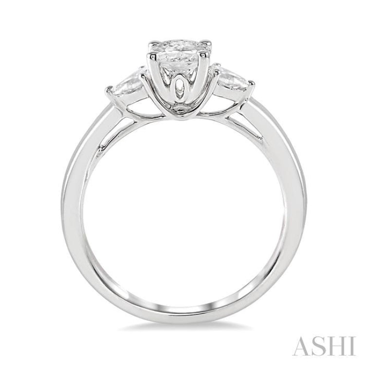 1/5 Ctw Pear Cut Diamond Semi-Mount Engagement Ring in 14K White Gold