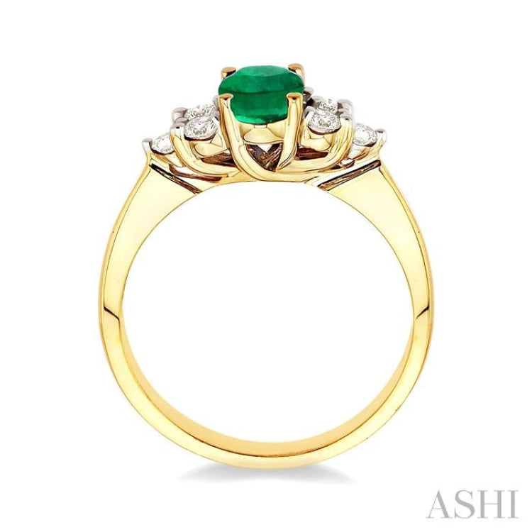 7x5mm Oval Cut Emerald and 1/3 Ctw Round Cut Diamond Ring in 14K Yellow Gold