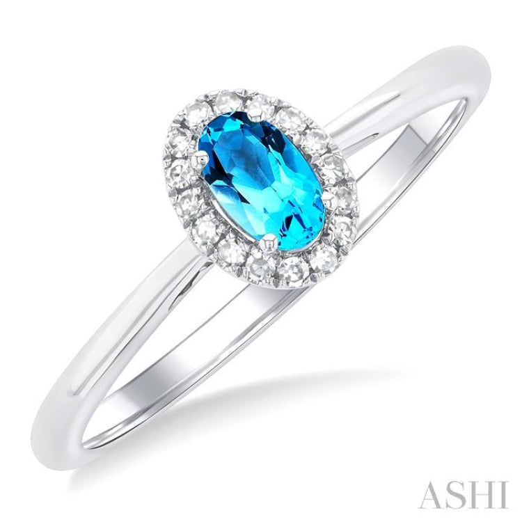 5x3 MM Oval Shape Blue Topaz and 1/20 Ctw Single Cut Diamond Halo Semi-Precious Ring in 14K White Gold