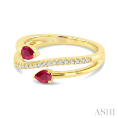 4X3 MM Pear Shape Ruby and 1/6 Ctw Round Cut Diamond Precious Ring in 10K Yellow Gold