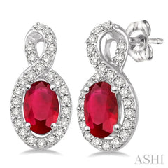 5x3 MM Oval Cut Ruby and 1/5 Ctw Round Cut Diamond Earrings in 10K White Gold