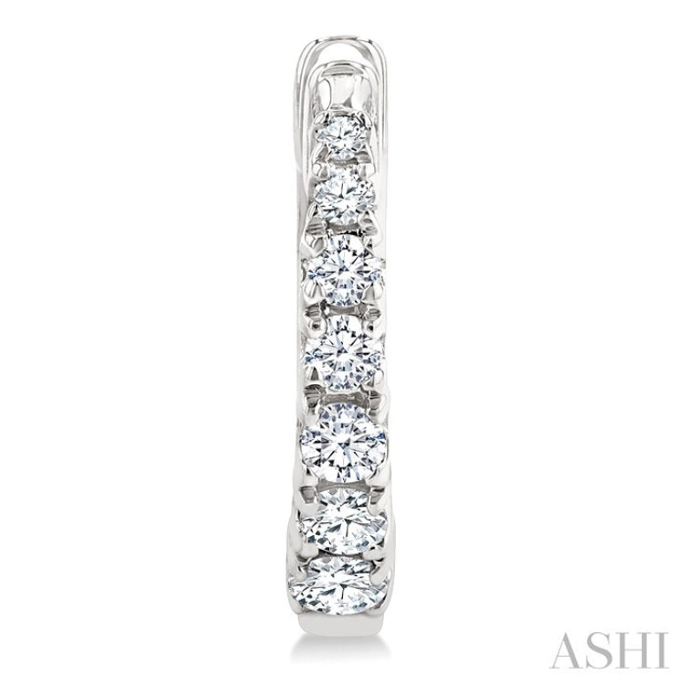1/4 Ctw Graduated Round Cut Diamond Fashion Huggie Petites in 10K White Gold
