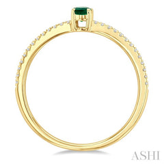 5x3 MM Oval Cut Emerald and 1/10 Ctw Petite Round Cut Diamond Precious Fashion Ring in 10K Yellow Gold