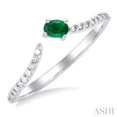 4X3 MM Oval Cut Emerald and 1/10 Ctw Petite Round Cut Diamond Precious Fashion Ring in 10K White Gold
