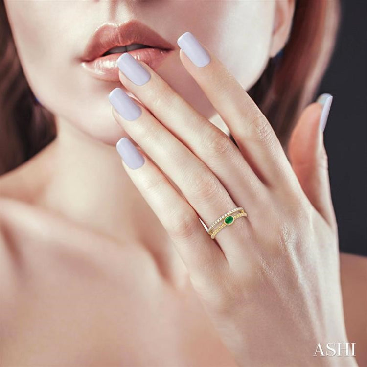 4x3 MM Oval Shape Emerald and 1/5 Ctw Round Cut Diamond Precious Fashion Split Twin Ring in 10K Yellow Gold