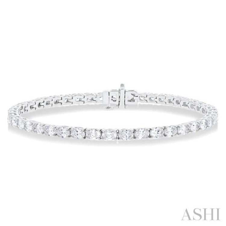 5 1/2 Ctw East West Oval Cut Diamond Fashion Tennis bracelet in 14K White Gold