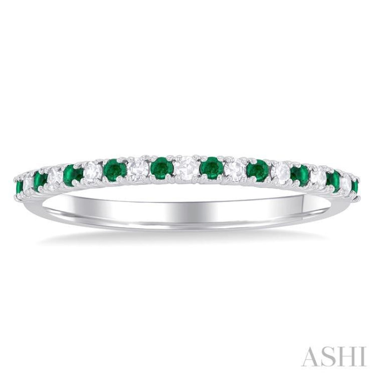 1.35 MM Round Cut Emerald and 1/10 Ctw Petite Round Cut Diamond Precious Stack Band in 10K White Gold