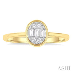 1/6 Ctw Petite Bezel Set Oval Shape Fusion Baguette and Round Cut Diamond Fashion Ring in 10K Yellow Gold