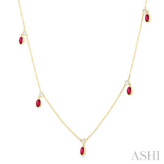 1/8 ctw Round Cut Diamonds and 5X3MM Oval Shape Ruby Precious Station Necklace in 10K Yellow Gold