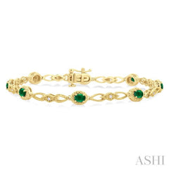 1/20 ctw Oval Cut 4X3MM Emerald and Round Cut Diamond Precious Fashion Bracelet in 10K Yellow Gold