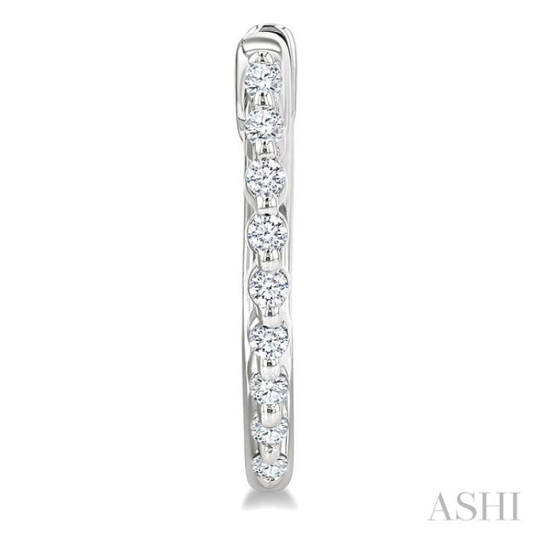 1/6 Ctw Petite Shared Prong Round Cut Diamond Hoop Earring in Sterling Silver